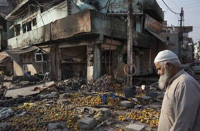 A man walks through a vandalized market after violence-ravaged New Delhi, India, Feb. 26, 2020. (Xinhua/Javed Dar) 