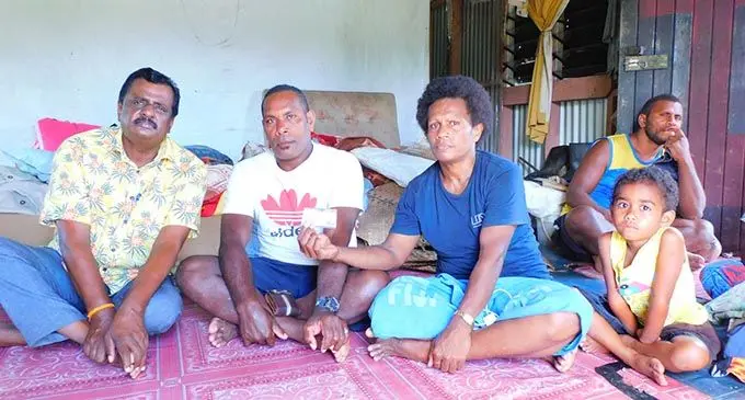 From left: Minister for Youth and Sports Parveen Bala, Simeli Bati and Anarieta Tinai who are the guardian of Suliano Tabua who was washed away by the current in Namara Village in Ra. Photos: Susana Hirst-Tuilau