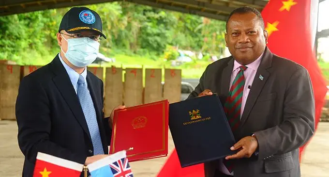 From left: Chinese Ambassador to Fiji Qian Bo and Minister for Defence, National Security and Foreign Affairs Inia Seruiratu during the handover ceremony of 47 military vehicles from the Chinese Government on Tuesday at the Queen Elizabeth Barracks, Nabuni Camp. Photo: Republic of Fiji Military Forces