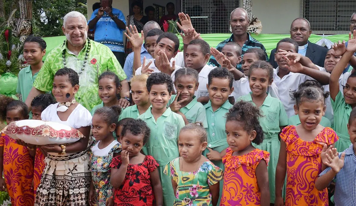 Prime Minister Voreqe Bainimarama with Ratu Veikusu Primary School student in Buretu Tailevu after opening the teachers quarters on October 22, 2019. Photo: Ronald Kumar.