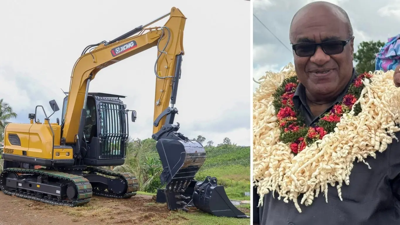 Deputy Prime Minister and Minister for Industries, Commerce and Business Development Manoa Kamikamica (right) after handing over an excavator to the Mataqali Waimaro Navoka Cooperative Limited in Naitasiri.