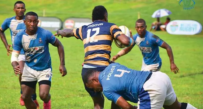 Veteran Police Blue playmaker Livai Ikanikoda (4) makes a tackle during the Fiji Bitter Wairiki Sevens tournament in Taveuni on January 27, 2024. Photo: Fiji Bitter Wairiki 7s