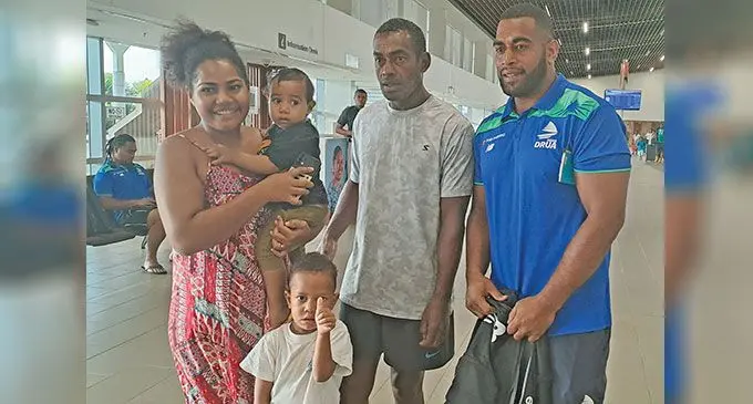 From left: Miriama Natave, carries baby daughter Arieta, son Bakewa, Sekove Natave with Swire Shipping Fijian Drua prop Livai Natave at Nadi International Airport on March 2, 2023. Photo: Waisea Nasokia