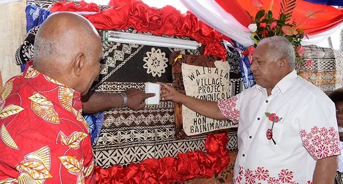 Turaga-na-Vunivalu Ratu Josefa Vuniamatana (left) and Prime Minister Voreqe Bainimarama switch on Waibalavu Village in Naitasiri, on November 1, 2019. Photo: Ronald Kumar