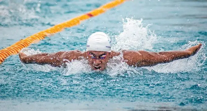 Temafa Yalimaiwai  during the men’s 100m Butterfly at the Suva Aquatice Centre on February 27, 2021. Photo: Leon Lord   