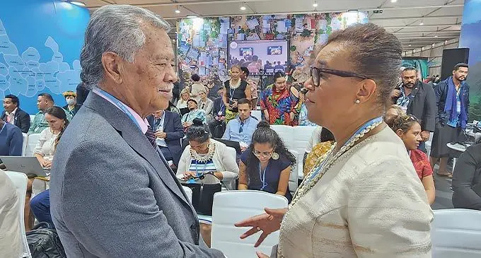 Pacific Islands Forum Secretary General Henry Puna speaks with Commonwealth Secretary General Patricia Scotland during a talanoa session at the Moana Blue Pacific Pavillion in Sharm El-Shiekh, Egypt on November 13, 2022.