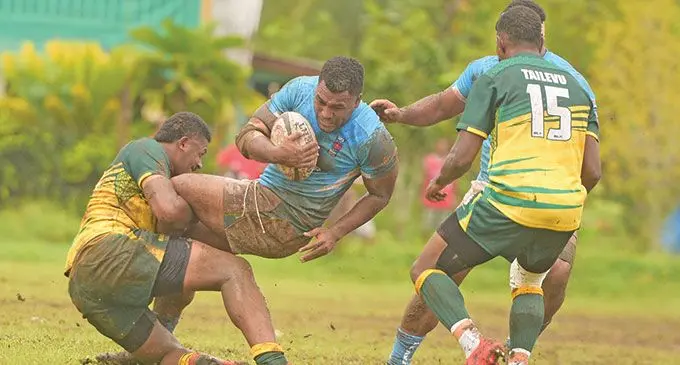 Ram Sami Suva winger, Misaele Petero (with ball) is taken in a tackle against Tailevu during their Skipper Fiji Rugby Championship at Ratu Cakobau Park ground 2, Nausori, on March 26, 2022. Suva will challenge Naitasiri for the Farebrother Trophy at Naluwai this Saturday. Photo: Ronald Kumar.