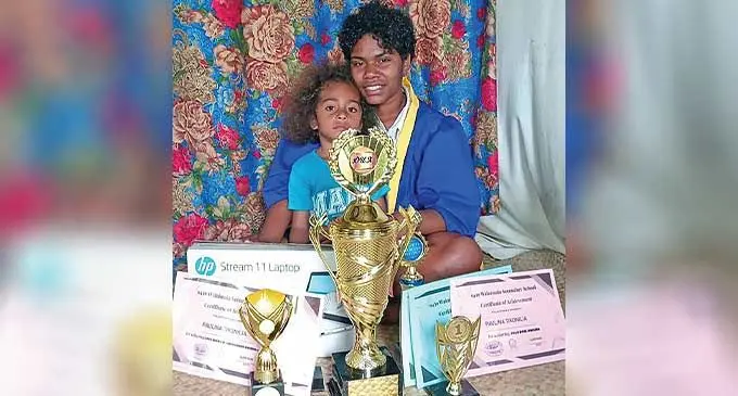 Paulina Tikonilia, with son Tomasi Matebau afterr the Wainimala Secondary School prizegiving ceremony on December 6, 2023.