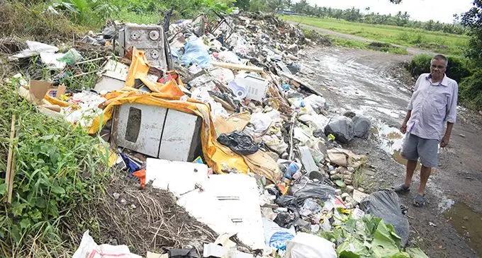 Lakena resident Anup Chandra, 58, on June 10, 2020, is not happy that people continue to dump their rubbish along the Lakena, Waituri Road junction.  Photo: Ronald Kumar
