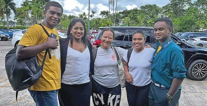 Justice Pacific CEO Elaine Chandra (2nd from left) with youth volunteers on April 21, 2023.