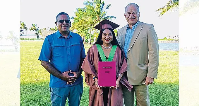 Azekah Swamy flanked by Isoa Korovulavula (left) and Kava Korp executive chairman John Sanday. Ms Swamy’s thesis ‘Extraction and analysis of fresh stems and roots of noble Fiji Kava plant cultivars’, studied the various kava extraction methods available.