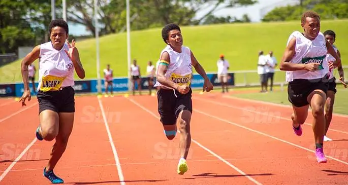 Lagakali’s Tokasa Turuva (first from left) and Domitila Naita battle for the Junior girls 100m final as the Makosoi’s Tirisiana Kiliraki (right) closes in during the Adi Cakobau School interhouse competition at ANZ Stadium, Suva, on February 20, 2021. Photo: Leon Lord