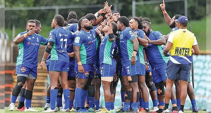 Swire Shipping Fijian Drua players gather for a pre-game prayer ritual. Photo: Fijian Drua