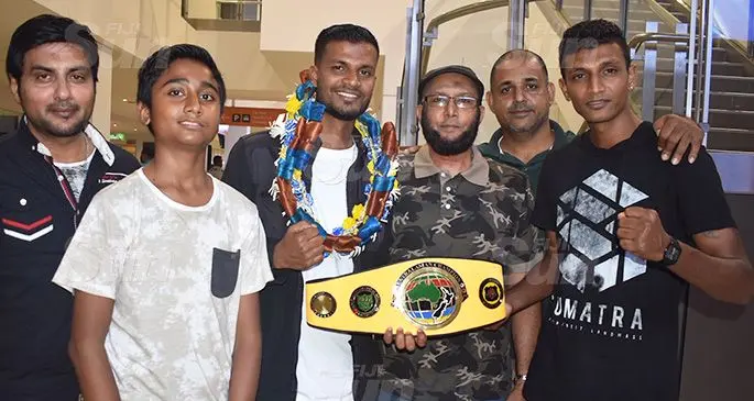 ANBF Australasian super featherweight champion Schin Mudaliar (third from left) with Boxing Commission of Fiji director Usman Lale Ali at Nadi International Airport on October 19, 2019. Photo: Mereleki Nai