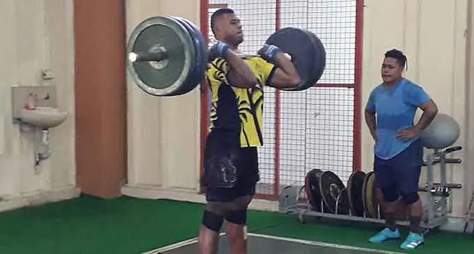Team Fiji weightlifting Taniela Rainibogi (left) training while Apolonia Vaivai looks on at the Rabuka Gym on July 19, 2022. Photo: Sereana Salalo.