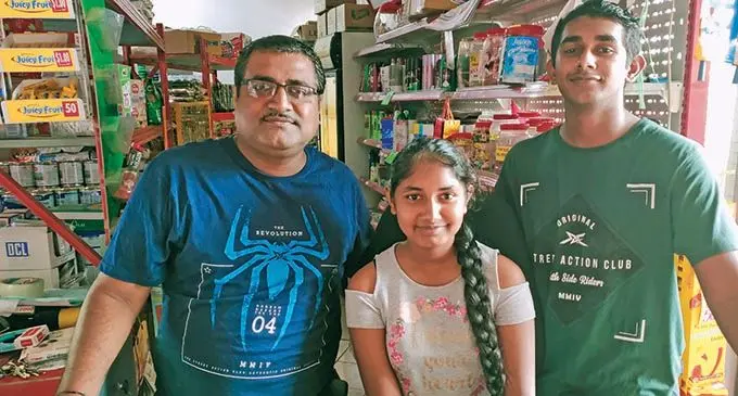 Saten Prasad (left) with his children Sukriti Prasad and Sidhaant Prasad inside their Naodamu SUpermarket in Labasa on November 30, 2020.Photo: Laisa Lui  