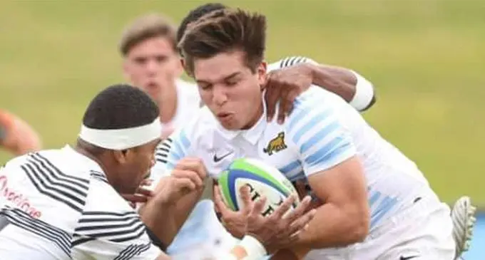 An U20 Argentina player on attack during their match against the U20 Fiji team at the Oceania Under-20 Rugby Championship.