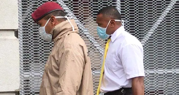 A Fiji Corrections Service officer escorts convicted rapist and former 7s star Amenoni Nasilasila outside court on July 27, 2020. Photo: Ashna Kumar