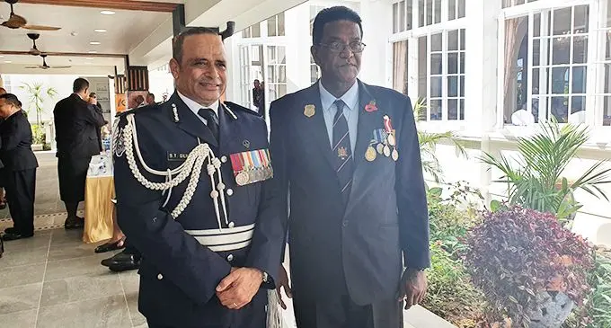 Commissioner of Police Brigadier General Sitiveni Qiliho (left) with Raymond Mukesh Reddy after the The Order of Fiji medal presentation at the State House on July 12, 2019.
