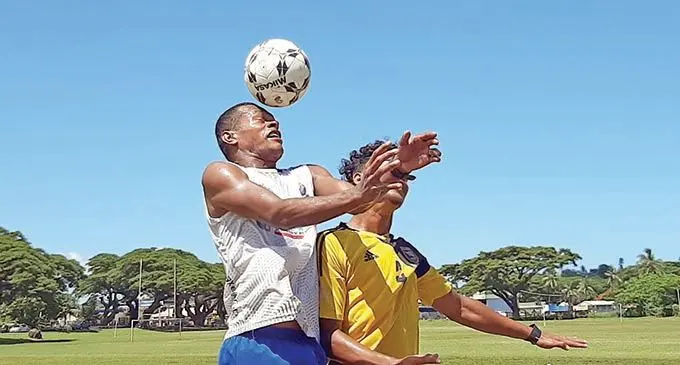 Viti Water Flow Lautoka striker Sairusi Nalaubu in an aerial battle with Nicky Pillay during training at Nadovu Park, Lautoka, on March 11, 2021. Photo: Salote Qalubau