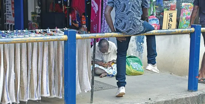 One of the many street beggars in Labasa Town.