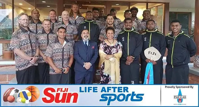 Vodafona Fijian Bati manager Mesake Navugona (Back from left) with Fiji High Commission staff in Canberra, Australia and members of the Bati side during the 2017 Rugby League World Cup.