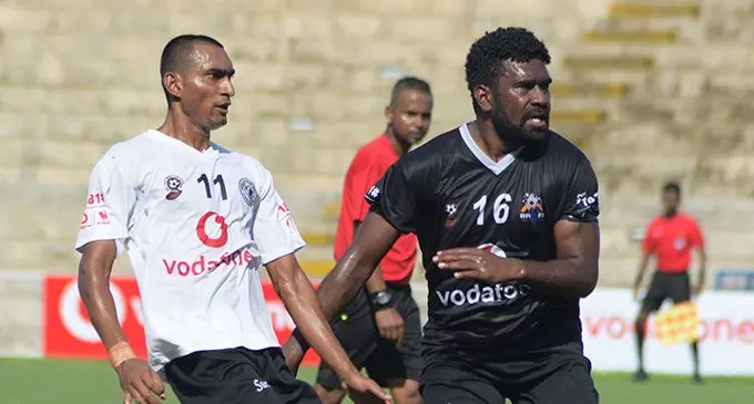 Ba's Malakai Tiwa (16) battles for possession against Madhwan Goundar during the Vodafone Premiere League in Suva on February 10, 2019. Photo: Simione Haravanua