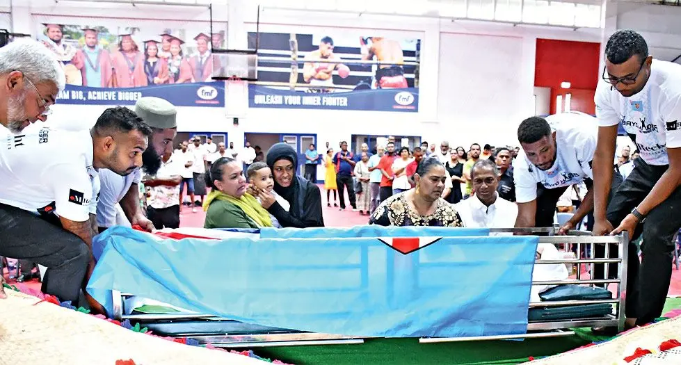 Wife of the late boxer Ubayd Haider, Margaret Singh, her son and Haider’s parents at the FMF Gym on November 12, 2024.  Photo: Ronald Kumar