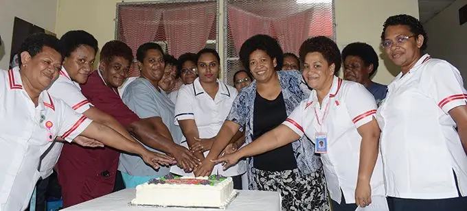 Nurses at the Colonial War Memorial Hospital maternity unit cut a cake to mark International Nurses Day on May 12, 20202. Photo: Ronald Kumar