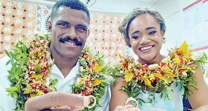 Newly weds...Olympian Jiuta Wainiqolo with wife Fiona Talei Weleilakeba show off their wedding rings during the legal wedding ceremony at Navua marriage registry Office on August 17, 2021. Photo: Ronald Kumar