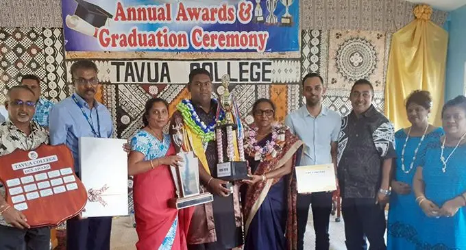 Tavua College dux awardee Shivnesh Prasad (centre), parents Jagdishwar Prasad (far left) and Maureen Singh with school staff after the prizegiving day on November 15, 2019. Photo: Shivika Prasad