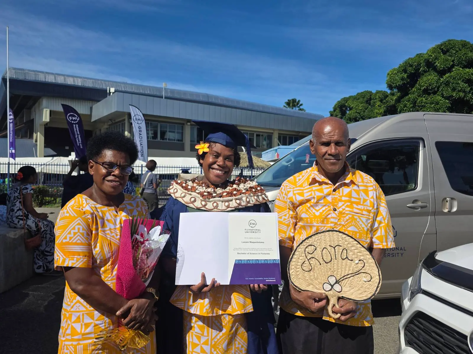 Ateca Waqa (Mother), Loraini Waqaniloloma (Graduate), Iireli Waqa (Father)  during the Fiji National University Graduation FMF Gymnasium in Suva on May 12, 2026. Photo: Lavenia Waqanivanua