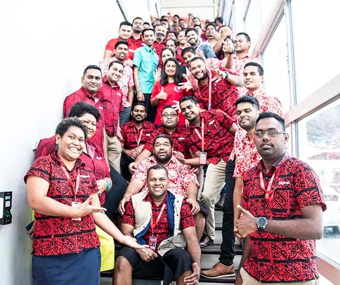 Digicel Fiji chief executive officer Mohammed Farid (standing middle light blue shirt) with staff at the Digicel Office- Khalsa Road on June 5, 2020.