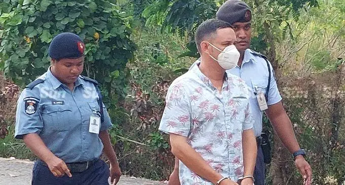 US National is escorted to the High Court in Lautoka on September 14,2022.  Photo: Salote Qalubau