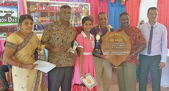 Yaadavi Naicker, dux of Vunika Primary School with her grandparents, teachers and invited guests in Labasa on December 6, 2022.
