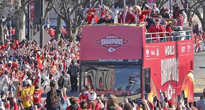 Kansas City Chiefs chairman and CEO Clark Hunt holds the Vince Lombardi trophy as their bus arrives at the Victory rally in Kansas City on February 14, 2024. Photo: AP
