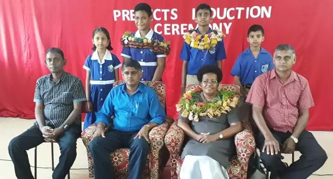 Nagigi Primary School newly inducted head prefects: (standing from left) Deputy headgirl Krisha Dutt, headgirl Paticia Motufaga, headboy Ayush Chandra, deputy headboy Gokul Dass with some teachers and invited guest in Labasa on February 8, 2018