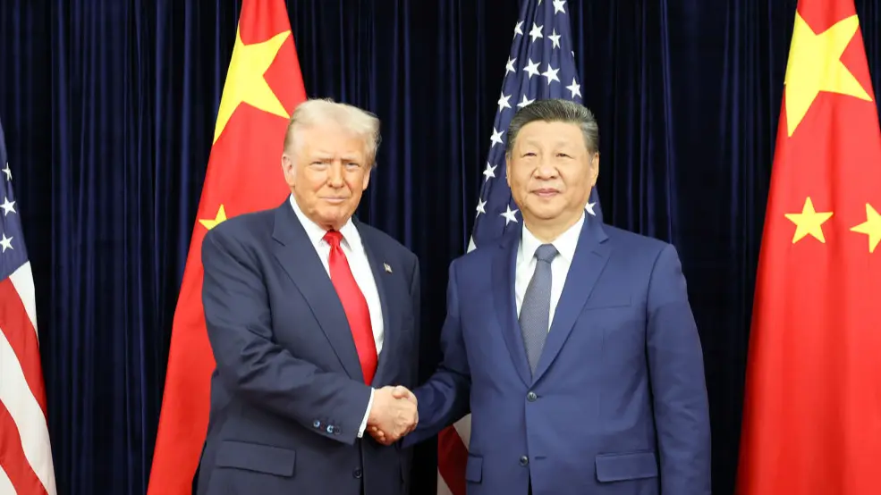 Chinese President Xi Jinping (R) shakes hands with U.S. President Donald Trump in Busan, the Republic of Korea, October 30, 2025. 
