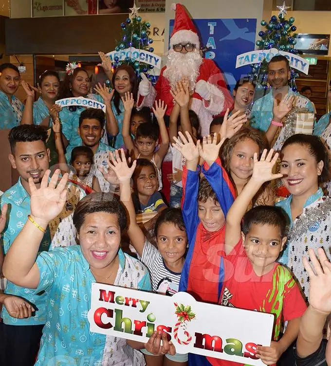 Many of children who visited the TappooCity complex in Suva had an opportunity to have a photo taken with Santa Claus. Photo: Ronald Kumar