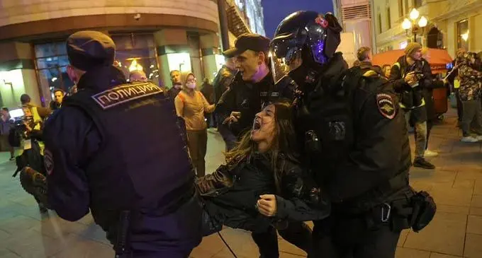 Protestors at an unsanctioned rally against the mobilisation of reservists in Moscow were dragged away by Russian police officers. Photo: REUTERS