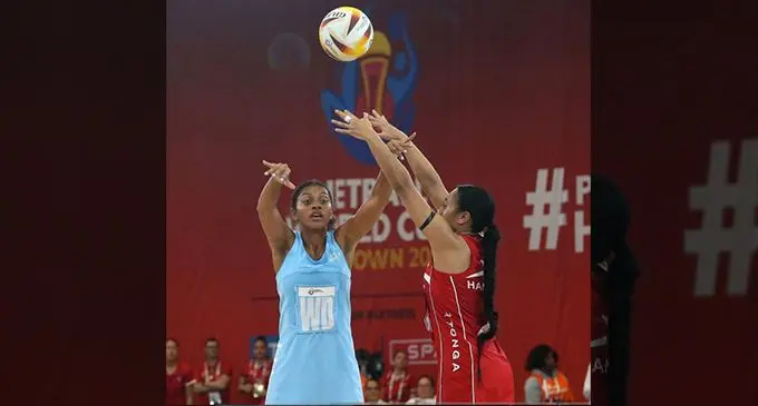 Fijian Pearls sub Joseph Nailumu (WD) passes the ball against Tonga Tala in their Netball World Cup opener in Cape Town, South Africa, on July 28, 2023. 
