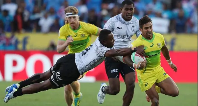 Fiji  Airways Fijian 7s playmaker Waisea Nacuqu makes a flying tackle on Australia’s Maurice Longbottom during their final pool clash of the New Zealand 7s at the FMG Stadium, New Zealand on January 26, 2019.  Photo: Australian Rugby.