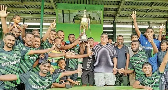 Fiji FA president Rajesh Patel with members of the Esy Kool Nalovo FC. Photo: Waisea Nasokia