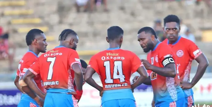 Navua defender Filipe Baravilala (right) urges his players during the BiC Fiji FA in Suva. Photo: Fiji Football