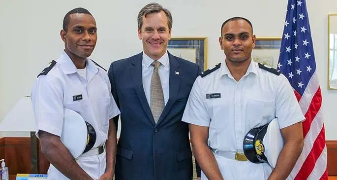 From left: Republic of Fiji Military Forces naval division midshipman Osea Melibua, US Ambassador Joseph Cella and RFMF Navy midshipman Adrian Siu Narayan. Photo: United States Embassy