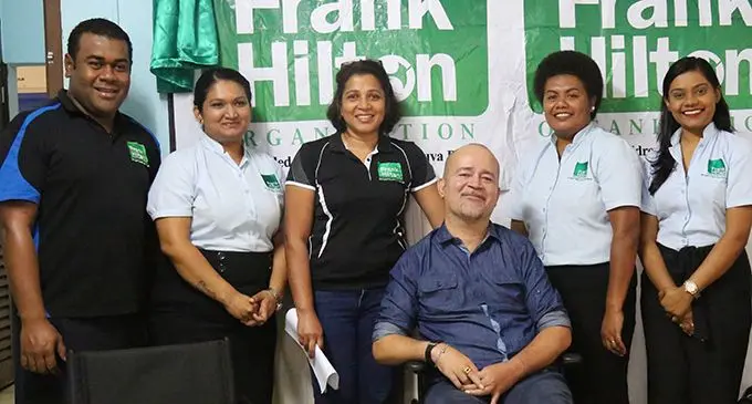 Fiji Disabled People’s Federation president Joshco Wakaniyasi (on wheelchair) with Frank Hilton organisation staff, (From left) Jope Liloma  (wheelchair technician), Sylvina Reddy (physiotherapist), Sureni Perera (chief executive officer), Anasavaia Navara (community rehabilitation  assistant) and Priyansha Chand (physiotherapist). Photo: Kelera Sovasiga