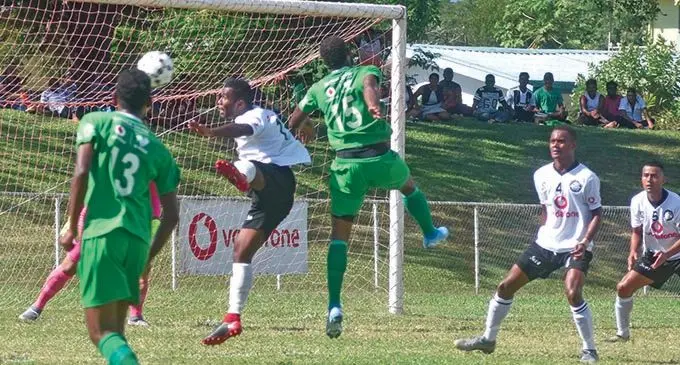 Suva football defender Filipe Baravilala defends against Nadi’s Napolioni Qasevakatini (15) during the Vodafone Premier League clash at Prince Charls Park ,Nadi on July 26, 2020. Photo: Waisea Nasokia