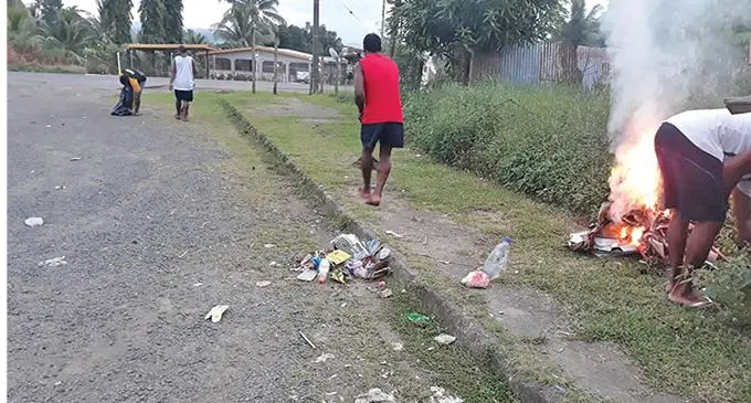 Youths cleaning up their neighbourhood for the “My Yasa vs Yours” Facebook challenge. Photo: Frank Hamagushi Facebook page