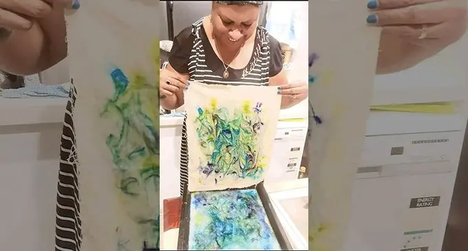 Renowned local and international fabric artist, Angie Rakai Niumataiwalu, shows one of her printed work during an earlier workshop