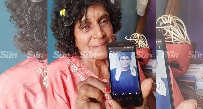 Shila Wati 72, seek answers as her her 35 year-old son, Steven Sachin Singh (pictured in phone) died and hios body was found in Toga Rewa on January 27, 2022. Photo: Ronald Kumar.